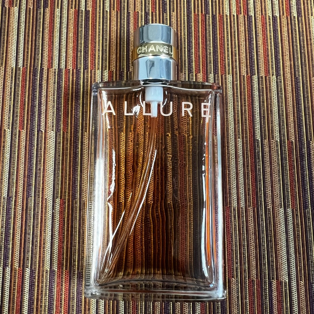 CHANEL Allure Fragrance with Rich Amber Tone